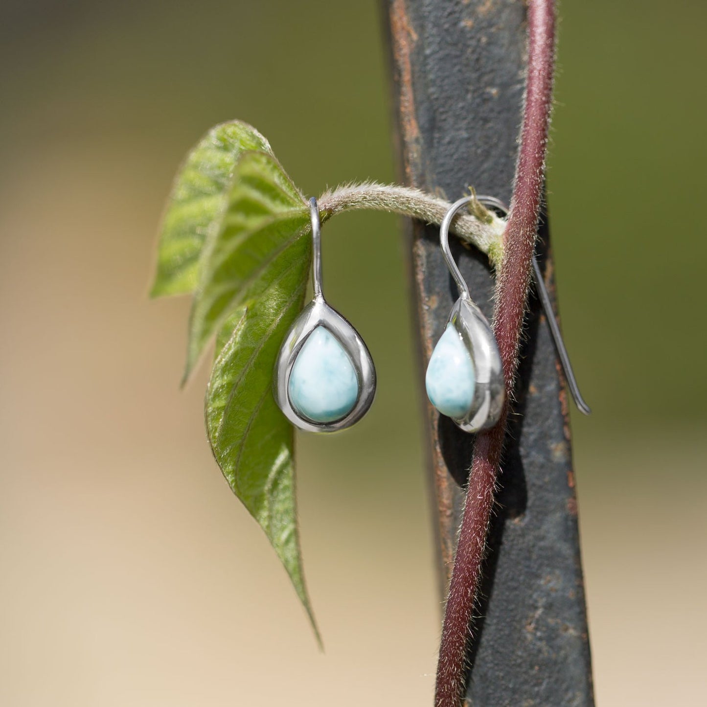 Rhodium Plated Pear Shape Larimar Earrings